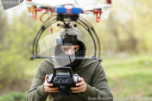 Image of Man flying with the drone
