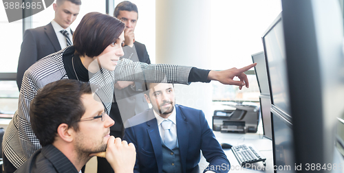 Image of Business team working in corporate office.