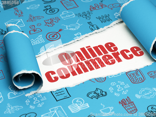 Image of Business concept: red text Online Commerce under the piece of  torn paper
