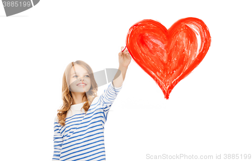 Image of girl drawing big red heart in the air