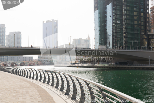 Image of Dubai city center with skyscrapers and bridge