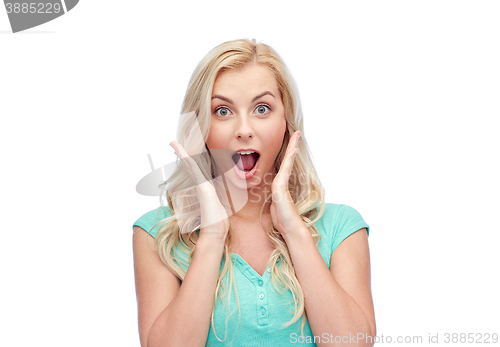 Image of surprised smiling young woman or teenage girl