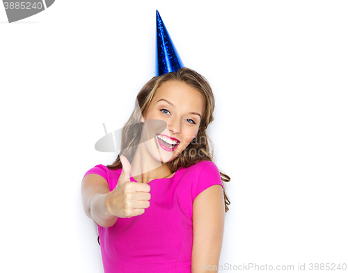 Image of happy young woman or teen girl in party cap