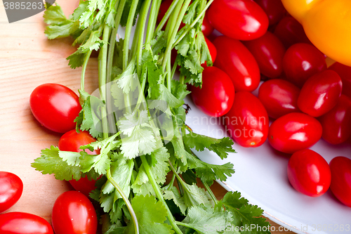 Image of vegetables on a wooden background