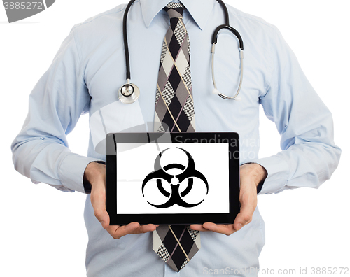 Image of Doctor holding tablet - Warning! Biohazard!