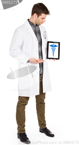 Image of Doctor holding tablet - Caduceus symbol