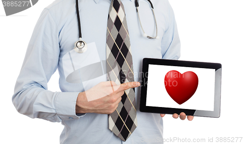 Image of Doctor holding tablet - Red heart