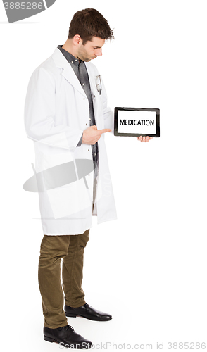 Image of Doctor holding tablet - Medication