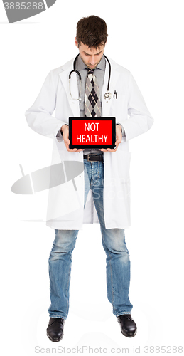 Image of Doctor holding tablet - Not healthy