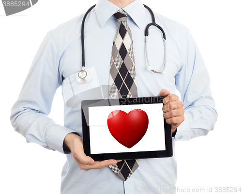 Image of Doctor holding tablet - Red heart