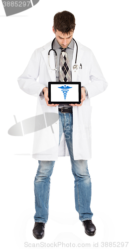 Image of Doctor holding tablet - Caduceus symbol