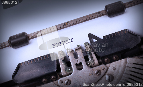 Image of Friday typography on a vintage typewriter