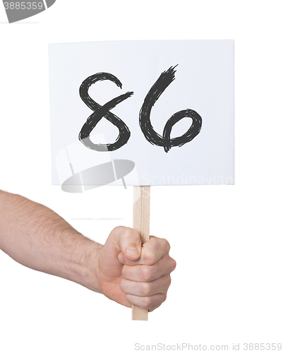 Image of Sign with a number, 86
