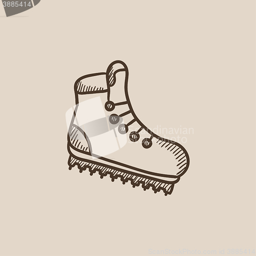 Image of Hiking boot with crampons sketch icon.