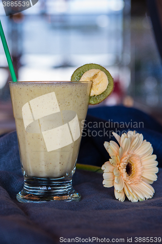 Image of smoothie made from kiwi, bananas and orange juice