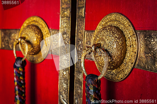 Image of Decorated door handles of Tibetan Buddhist monastery