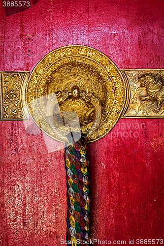 Image of Decorated door handles of Tibetan Buddhist monastery