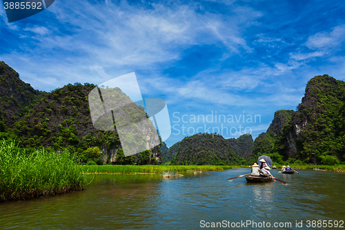 Image of Tourists on boats in Vietnam