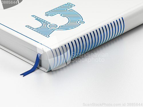 Image of Science concept: closed book, Microscope on white background