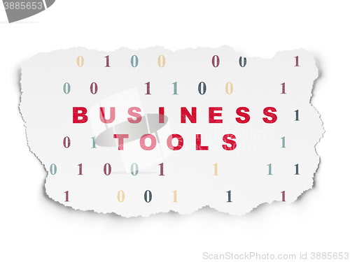 Image of Business concept: Business Tools on Torn Paper background