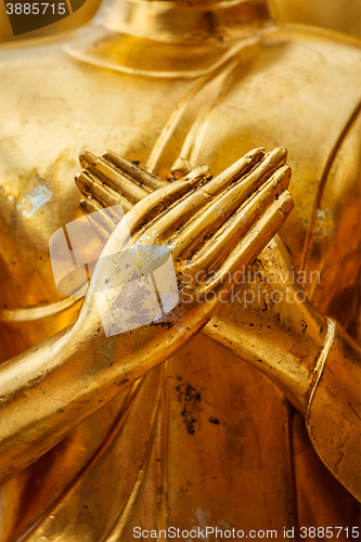 Image of Buddha statue hands close up