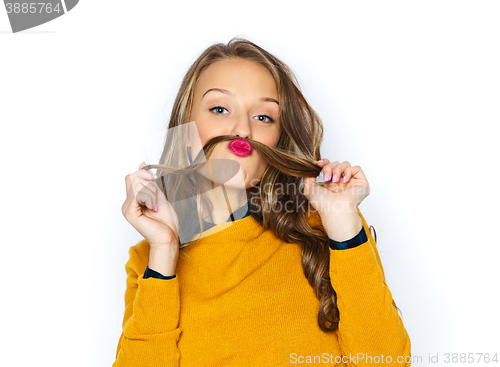 Image of happy young woman or teen girl in casual clothes