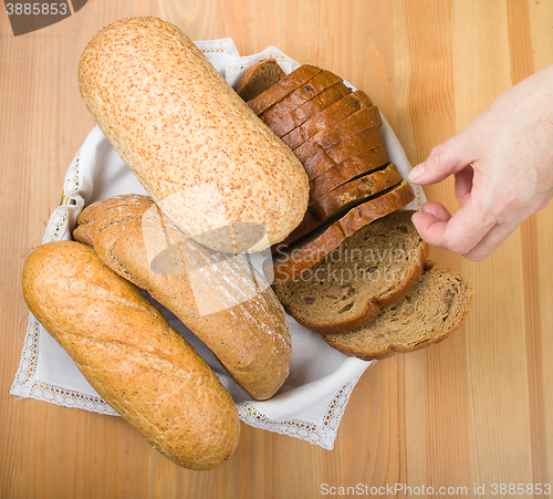 Image of Freshly baked bread with homespun fabric 