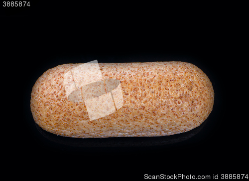 Image of Large loaf of bread isolated on black