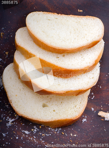 Image of fresh bread  on wooden