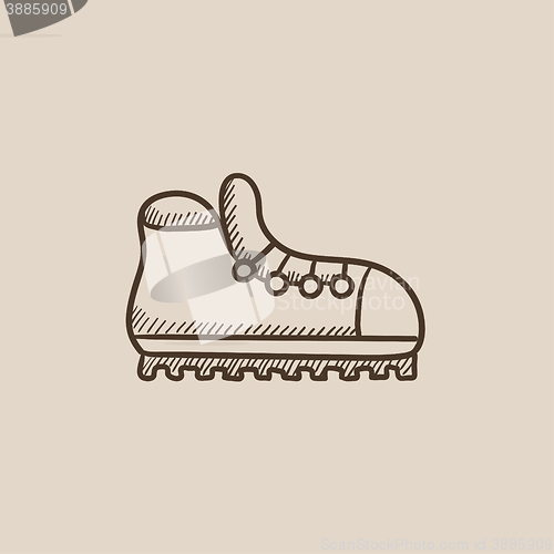 Image of Hiking boot with crampons sketch icon.