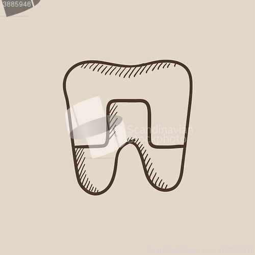 Image of Crowned tooth sketch icon.