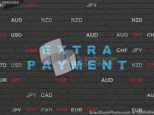 Image of Currency concept: Extra Payment on wall background