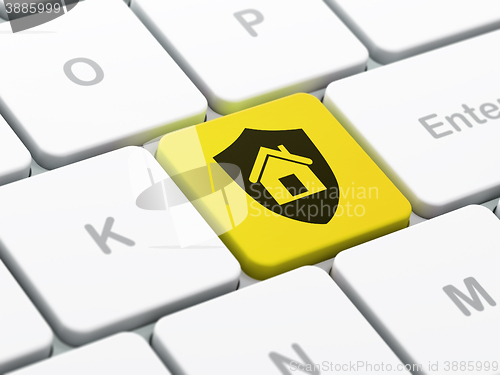 Image of Business concept: Shield on computer keyboard background