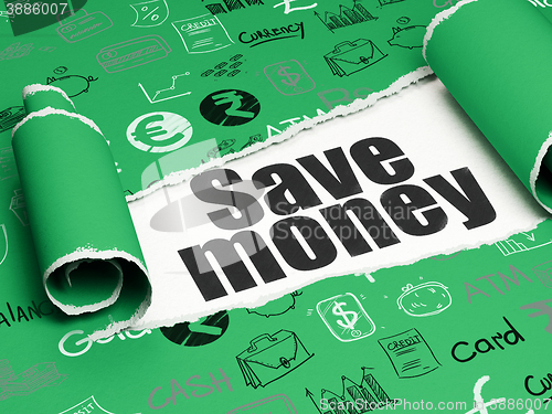 Image of Currency concept: black text Save Money under the piece of  torn paper