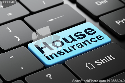 Image of Insurance concept: House Insurance on computer keyboard background