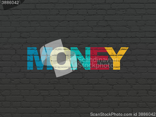 Image of Business concept: Money on wall background