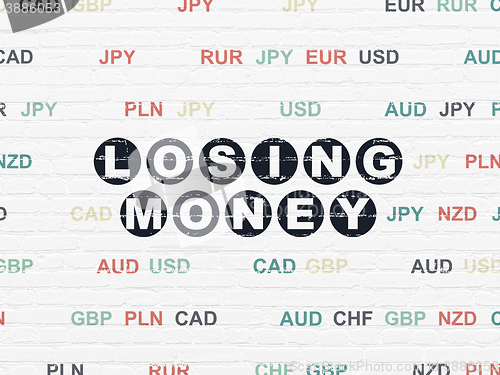 Image of Money concept: Losing Money on wall background