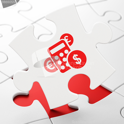 Image of Business concept: Calculator on puzzle background