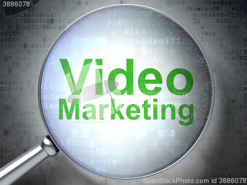 Image of Finance concept: Video Marketing with optical glass