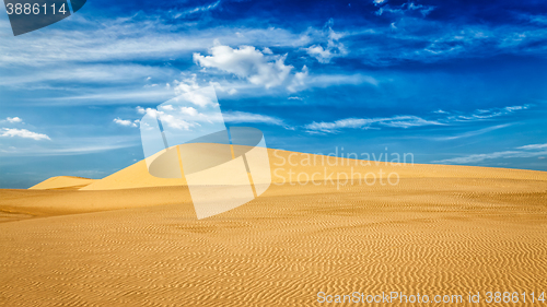 Image of Desert sand dunes on sunrise