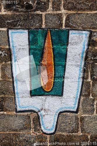 Image of Vushnu symbol on Hindu temple wall