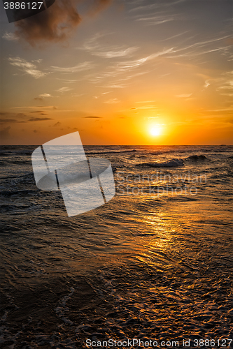 Image of Ocean sunset with waves