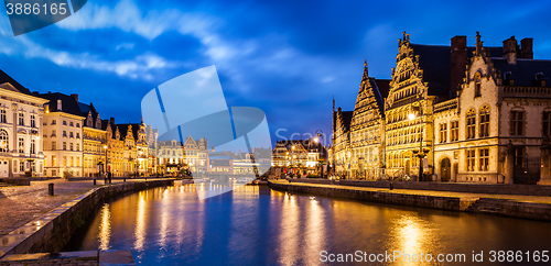 Image of Ghent canal, Graslei and Korenlei streets in the evening. Ghent,