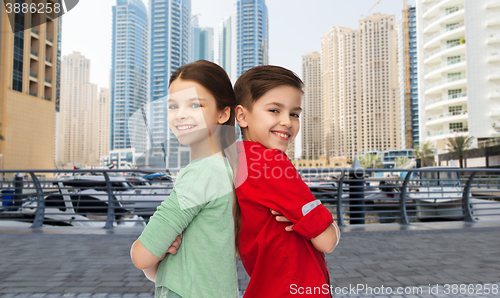 Image of happy boy and girl standing together