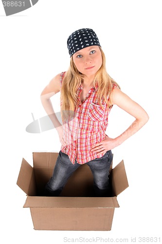 Image of Girl in a cardboard box, looking up