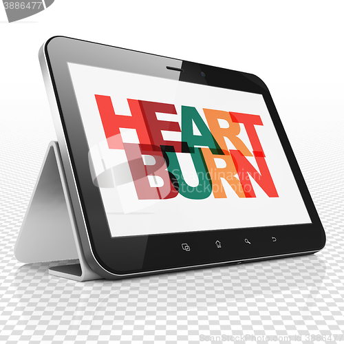 Image of Health concept: Tablet Computer with Heartburn on  display