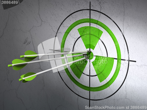 Image of Science concept: arrows in Radiation target on wall background
