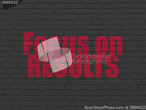 Image of Finance concept: Focus on RESULTS on wall background