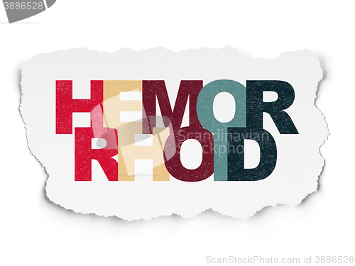 Image of Healthcare concept: Hemorrhoid on Torn Paper background