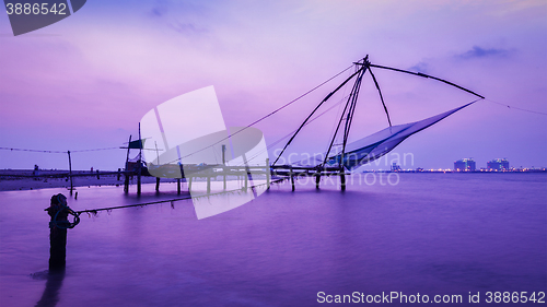 Image of Chinese fishnets on sunset. Kochi, Kerala, India